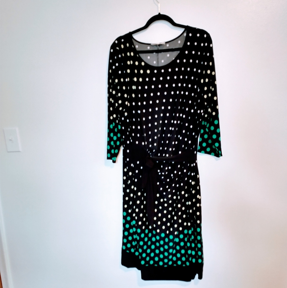 Pink Rose polkadot knee length dress with front tie. Stretchy fabric, elbow leng